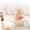 pexels-photo-7101397-7101397 Cute Asian toddler in swimwear sitting in foamy water in bathtub and playing with soap bubbles