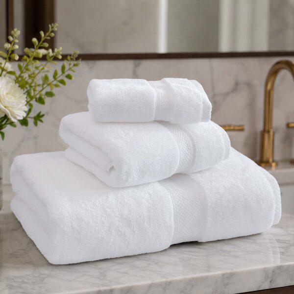 Close-up of Samifyhome luxury white bath, hand, and face towels stacked in a bathroom